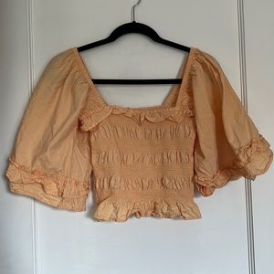 Orange Free People top. Size xs